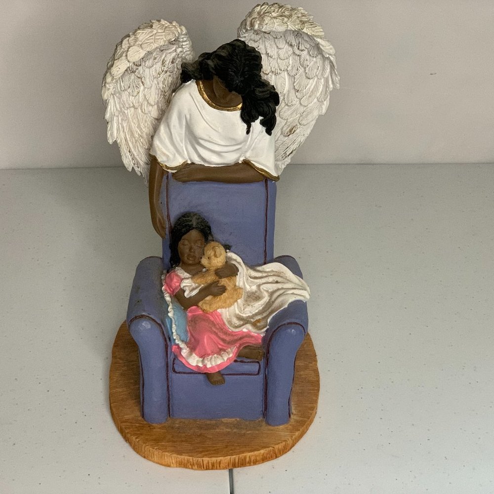 Porcelin Black Angel Overlooking Child 10 Inch